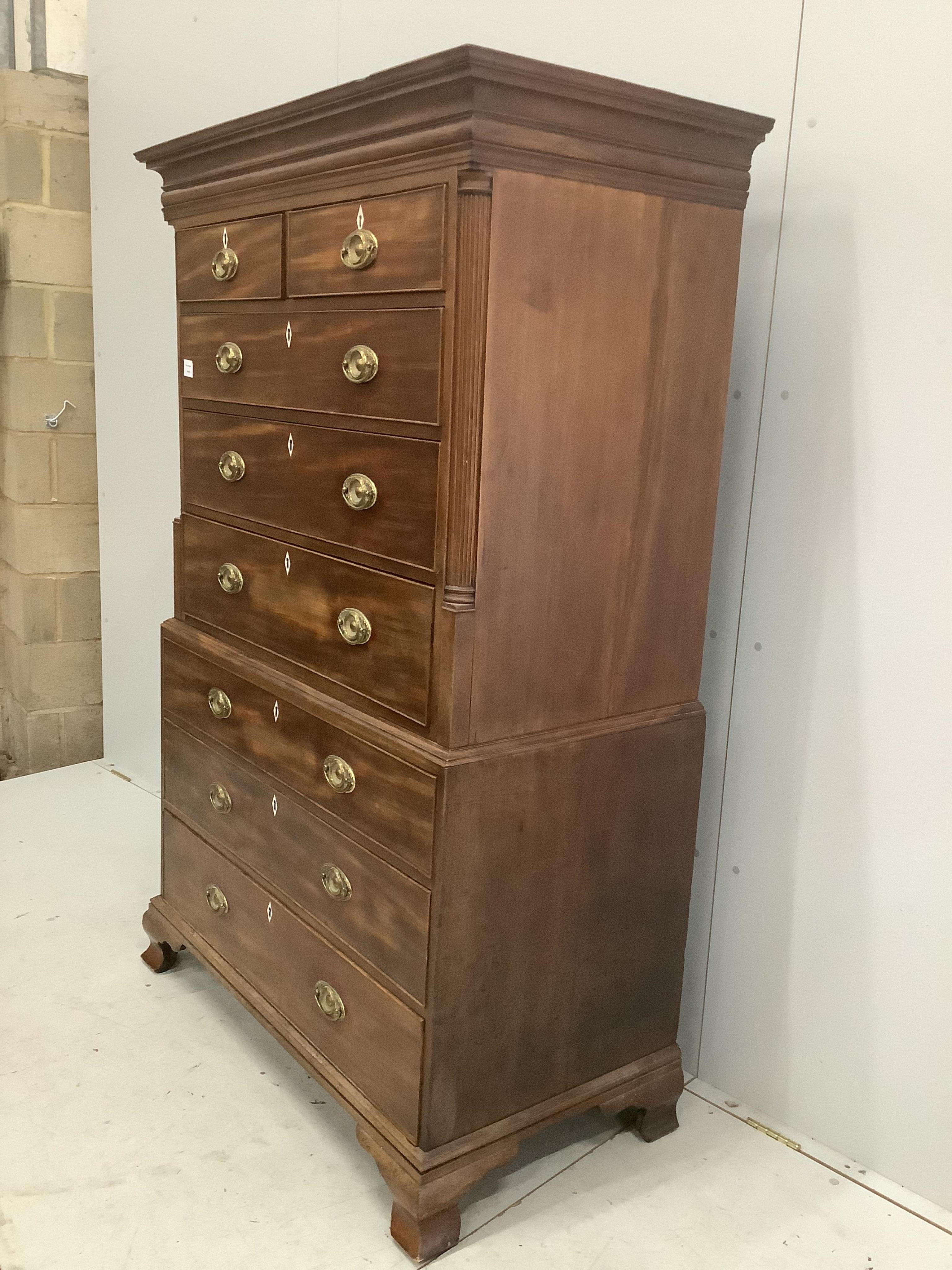 A George III mahogany chest on chest, width 111, depth 58cm, height 174cm. Condition - fair